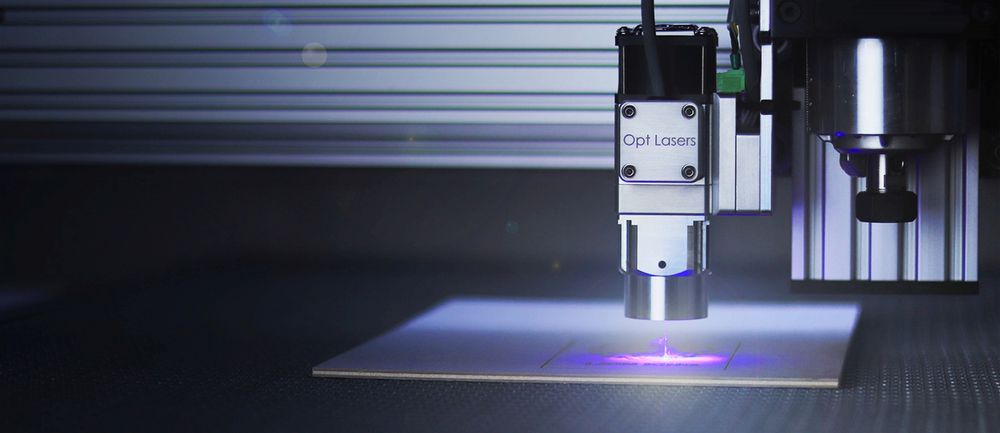 Close-up of a laser cutting machine at work, with no people in view